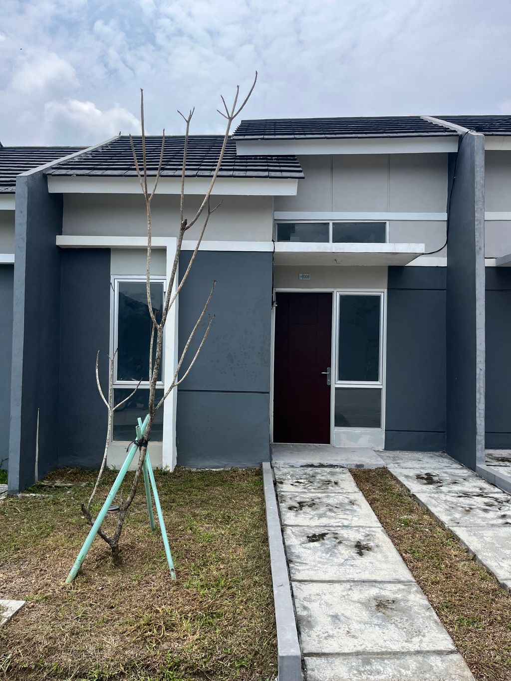 foto tampak rumah tipe RS 22/60 perumahan MODERNLAND CILEJIT-MERATUS