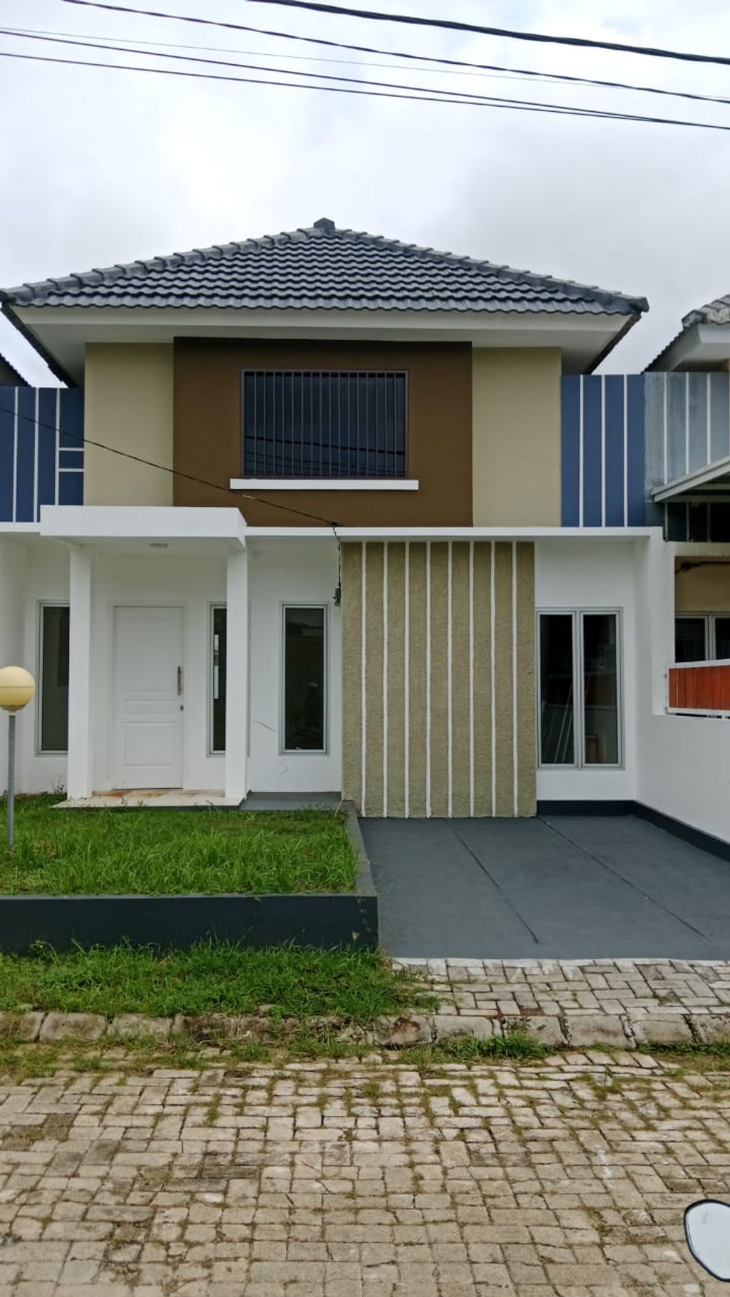 foto tampak rumah tipe CASCADE perumahan Pramuka Garden Residence