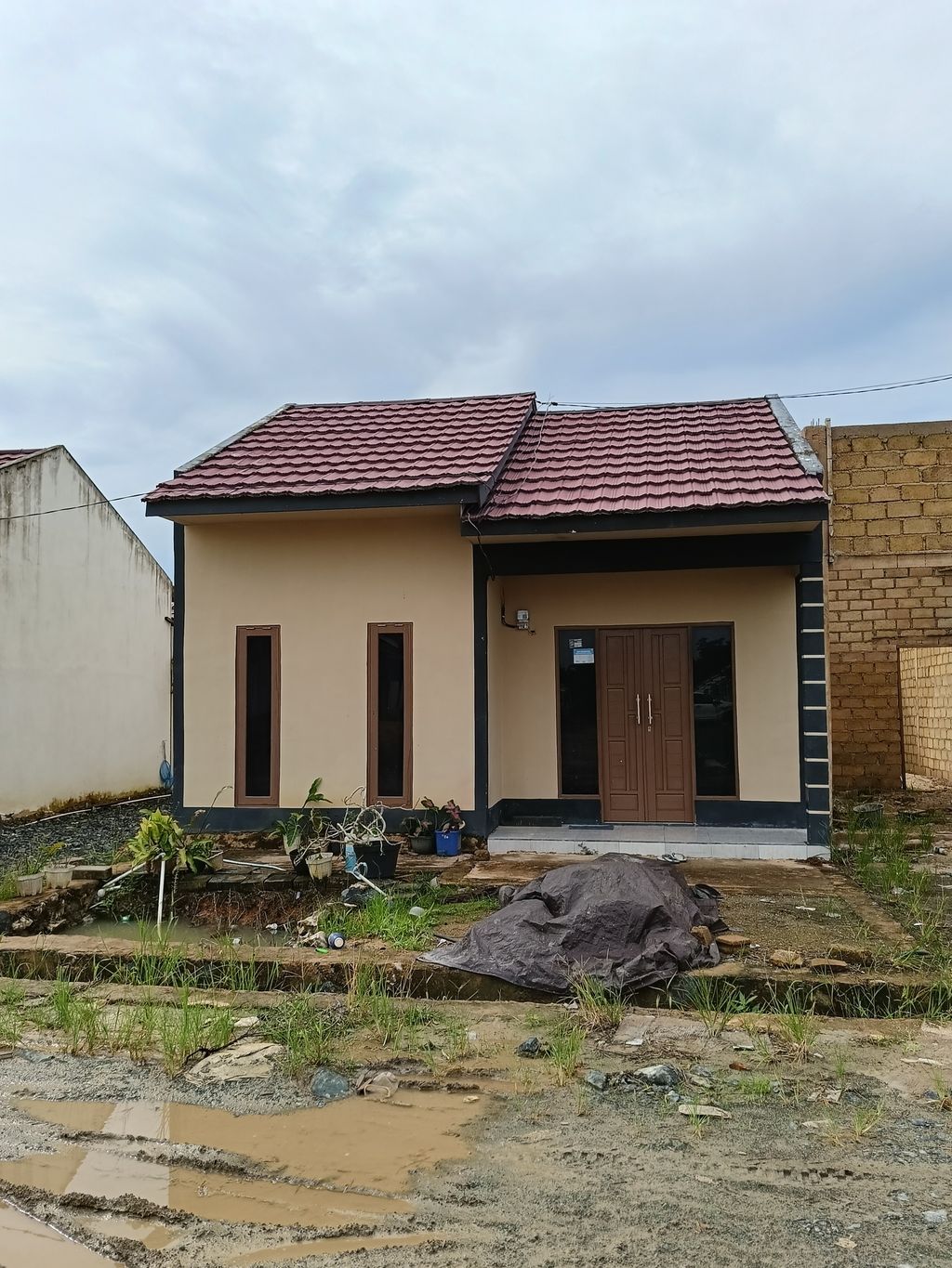 foto tampak rumah tipe CKR SUBSIDI 36 perumahan CITRA KHASANAH RESIDENT