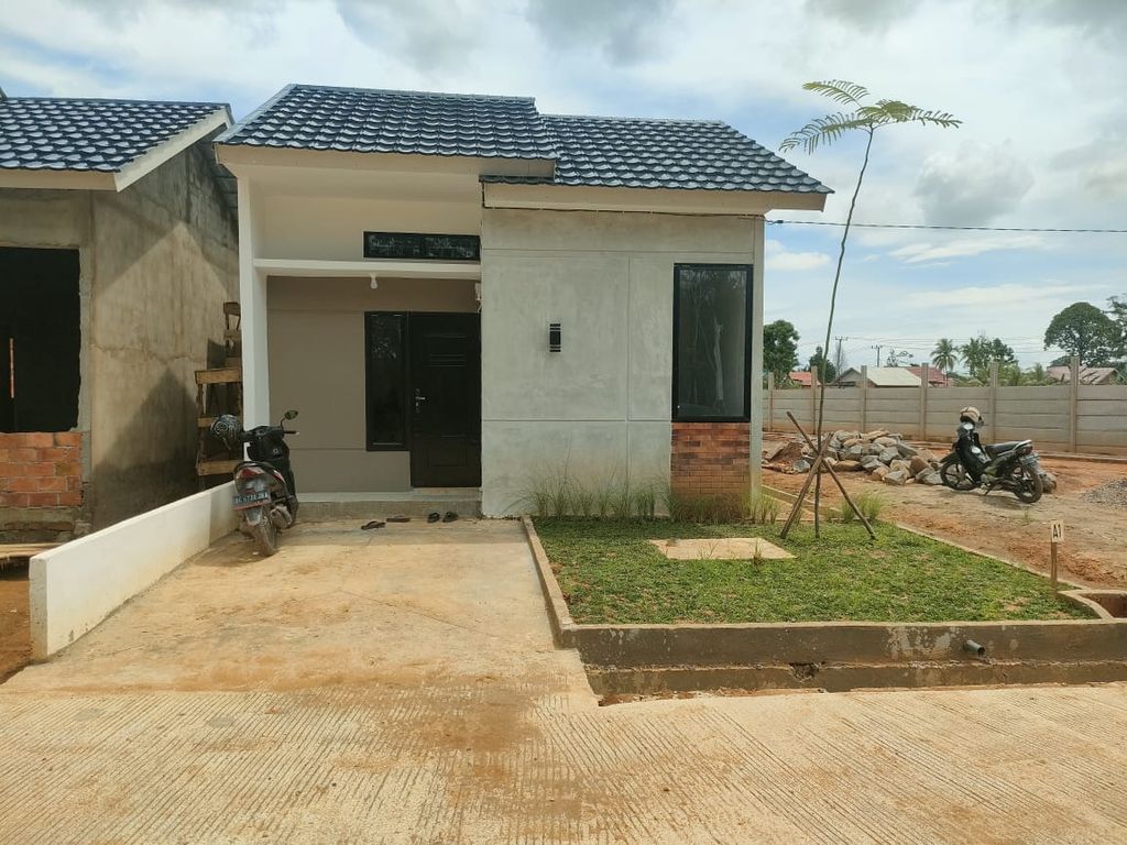foto tampak rumah tipe 36/98 perumahan GRIYA LESTARI RESIDENCES