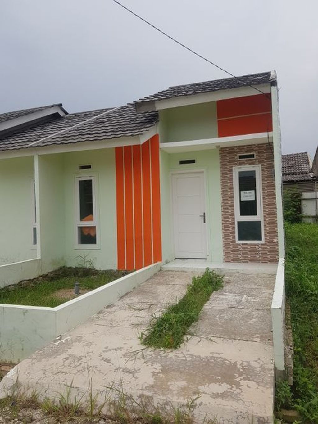 foto tampak rumah tipe SUBSIDI perumahan BUMI MUTIARA INDAH II