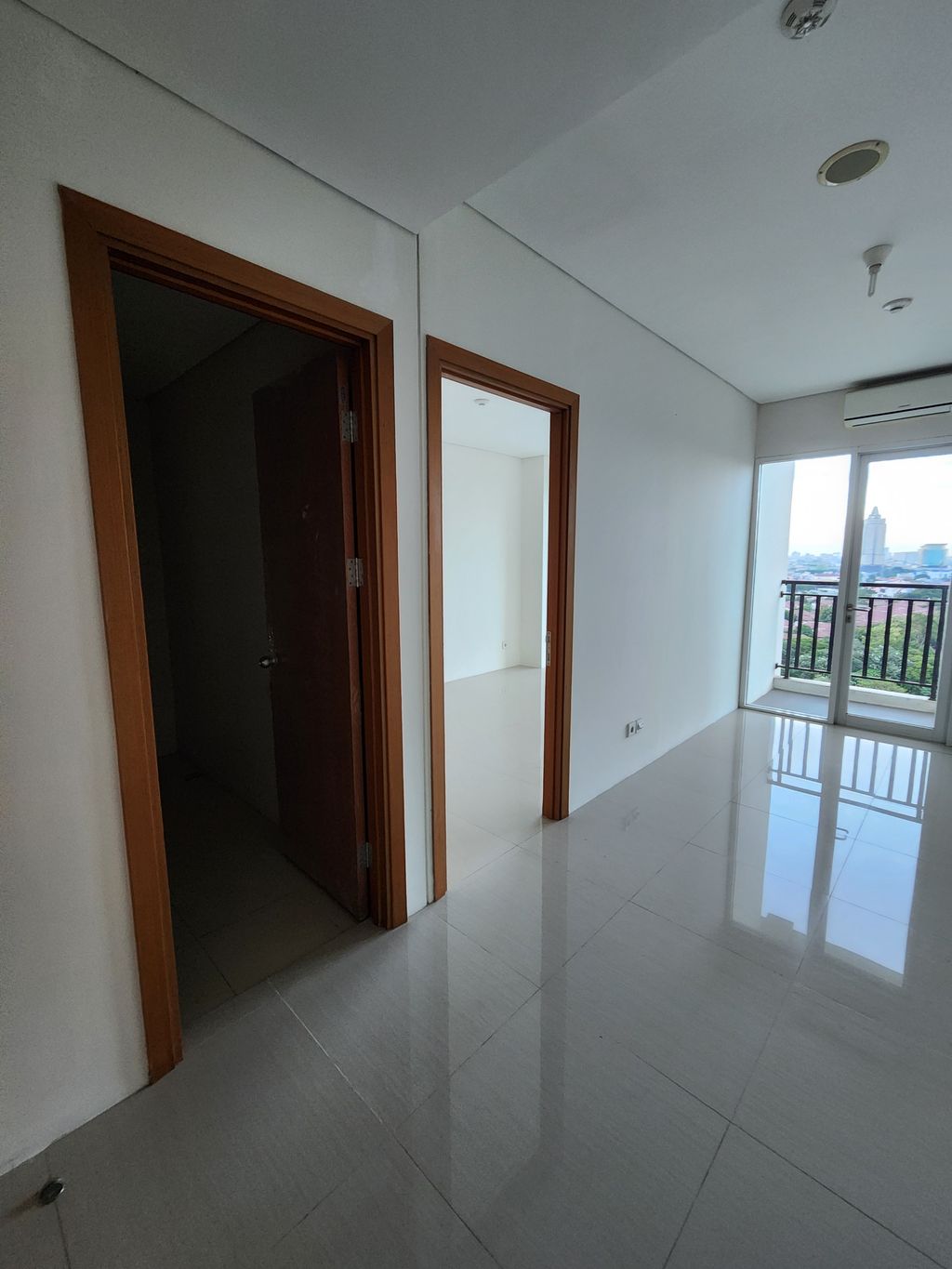 foto tampak rumah tipe 1 BR B perumahan Woodland Park Residence