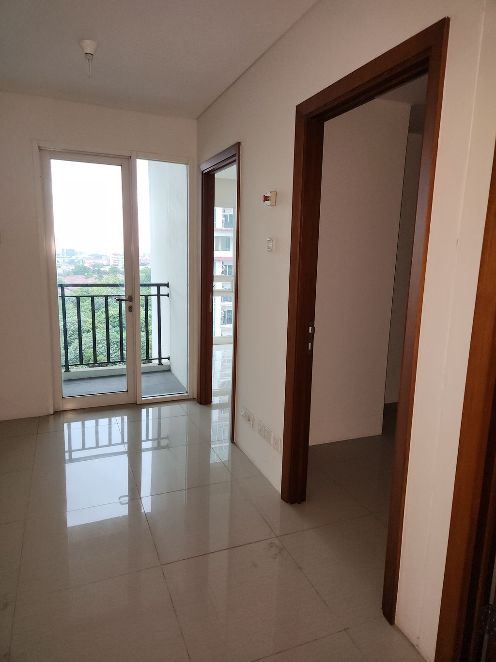 foto tampak rumah tipe 1 BR+1 perumahan Woodland Park Residence