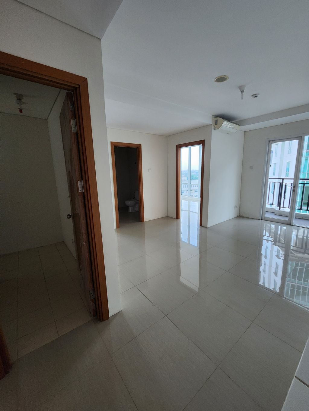 foto tampak rumah tipe 2 BR+1 A perumahan Woodland Park Residence