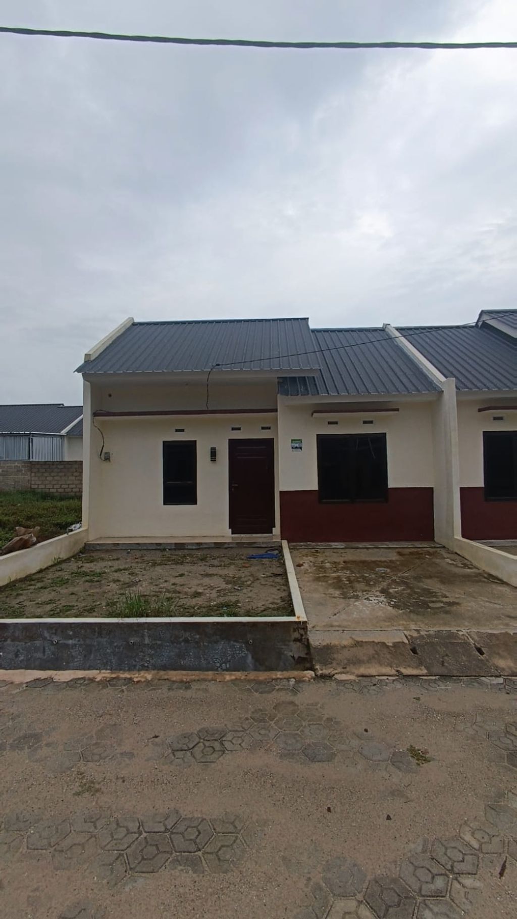 foto tampak rumah tipe H-1 perumahan PURI KENANGA RIVER VIEW - TAHAP 2