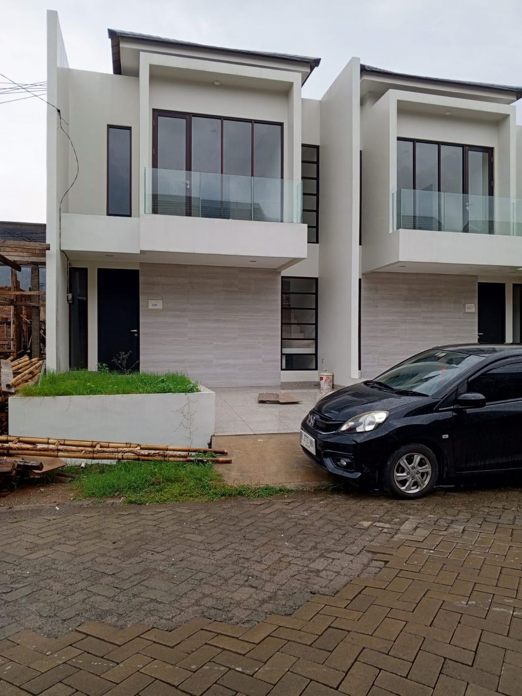 foto tampak rumah tipe D 4 NO 21 perumahan Daan Mogot Arcadia
