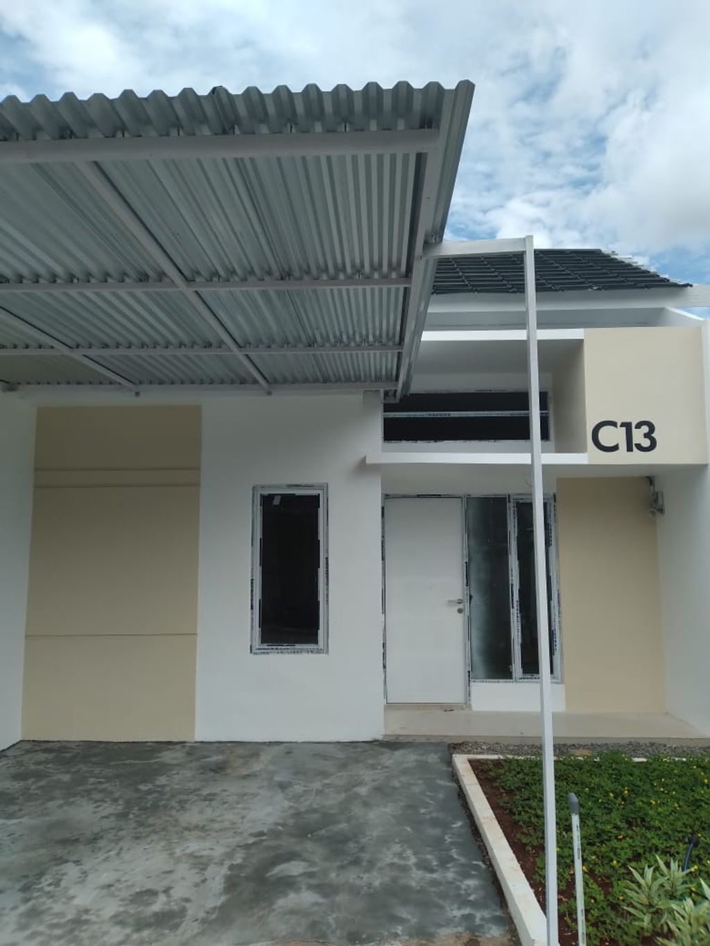 foto tampak rumah tipe 41 perumahan Griya Kenari Pattalassang