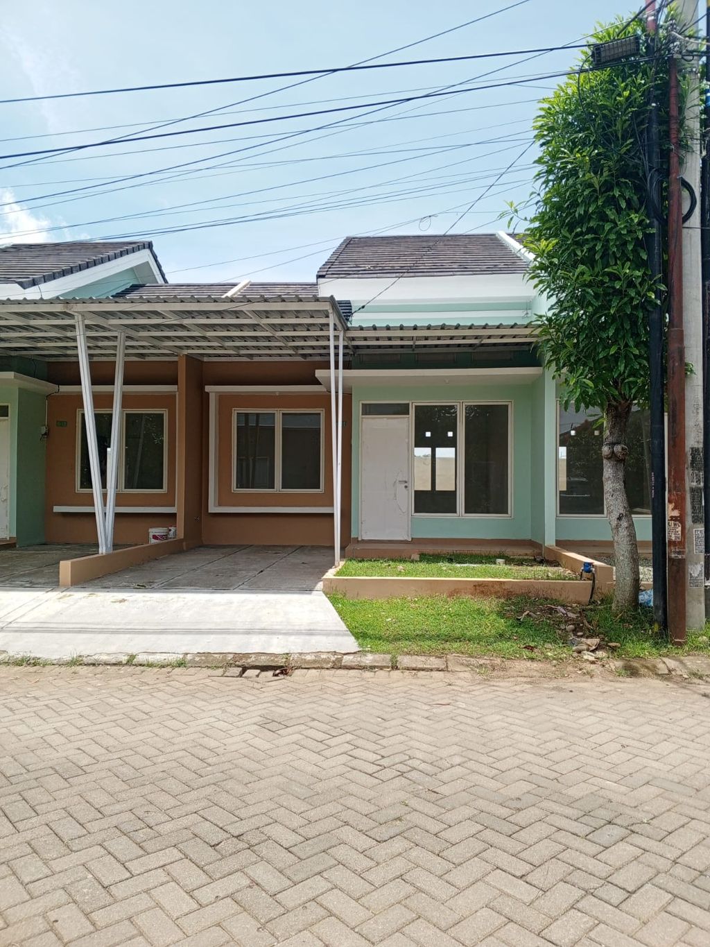 foto tampak rumah tipe BERRYL perumahan MUTIARA INDAH VILLAGE