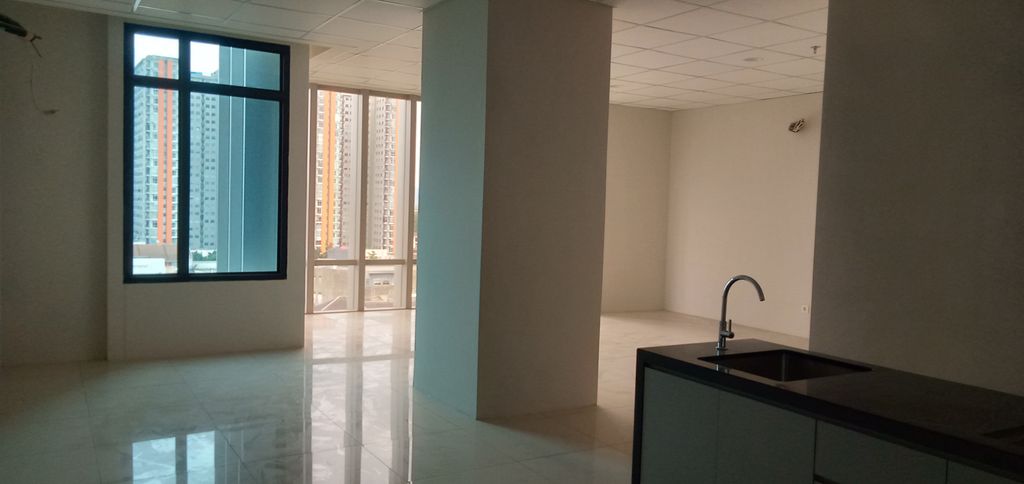 foto tampak rumah tipe E perumahan HQUARTERS BUSINESS RESIDENCE