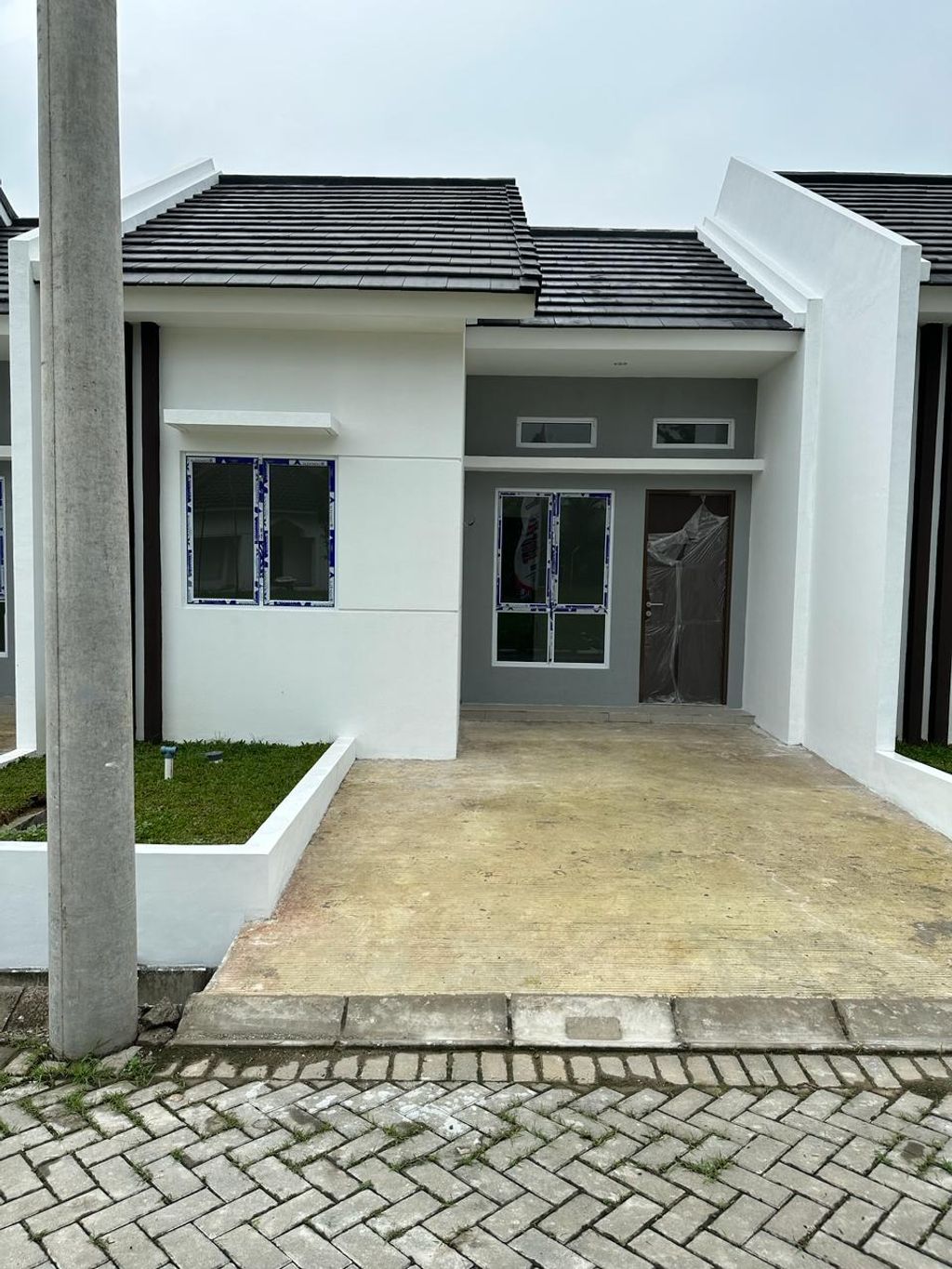 foto tampak rumah tipe A Blok G9 perumahan Graha Mirai