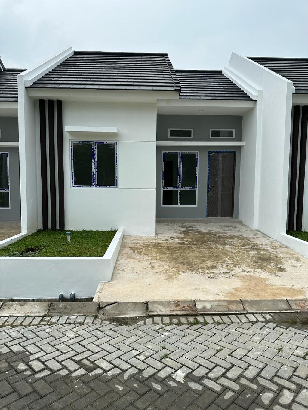 foto tampak rumah tipe A Blok G8 perumahan Graha Mirai