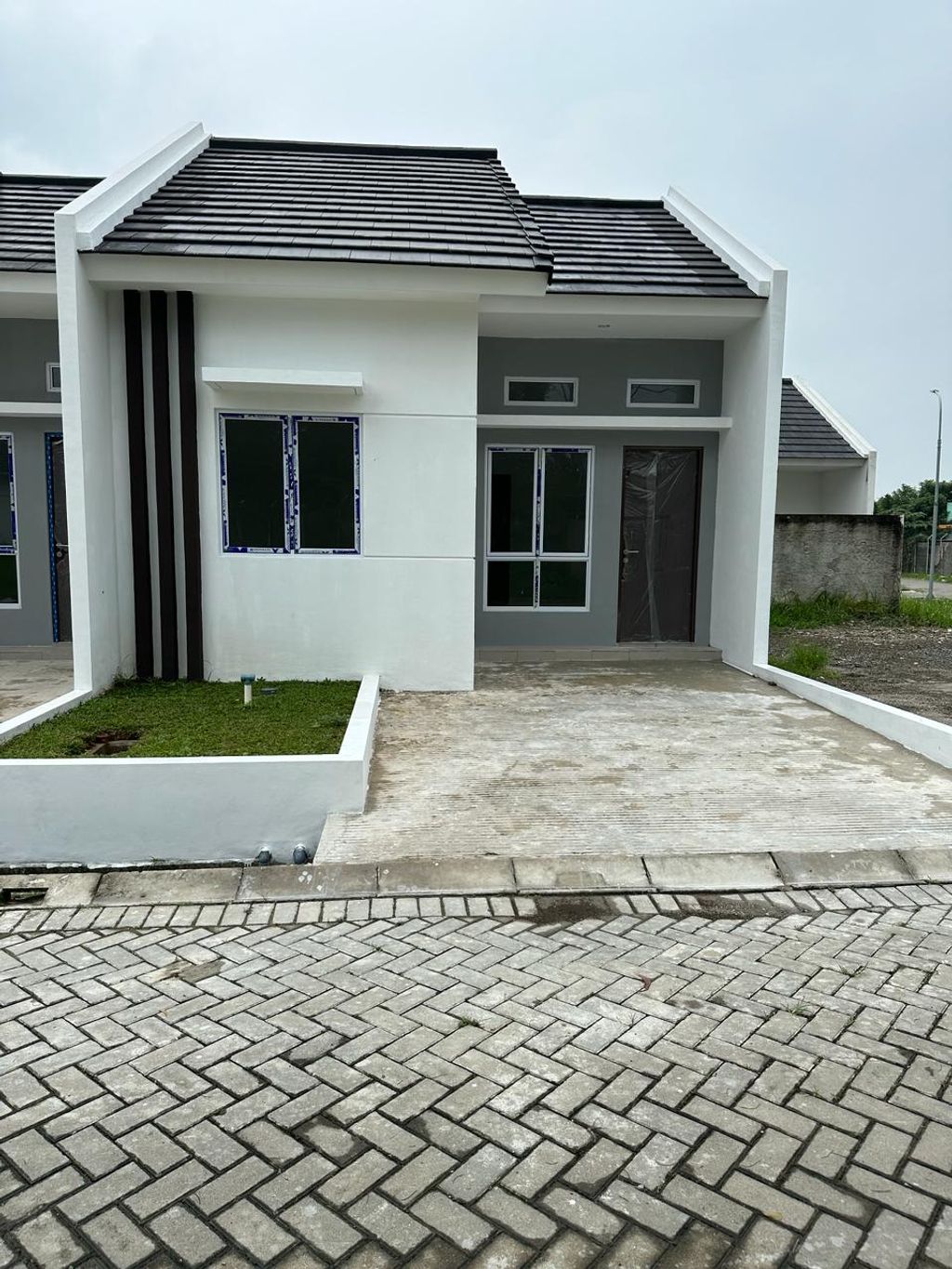 foto tampak rumah tipe A Blok G10 perumahan Graha Mirai