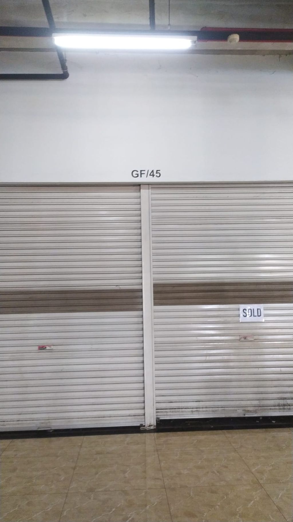 foto tampak rumah tipe GF45 perumahan APARTEMEN TAMAN SARI URBANO