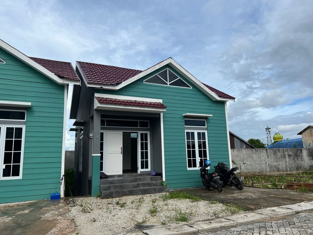 foto tampak rumah tipe ASHOKA KAV.64 perumahan Cluster Ashoka