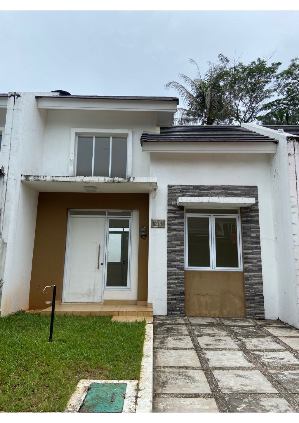 foto tampak rumah tipe NC12 - 76 perumahan SERPONG NATURA CITY