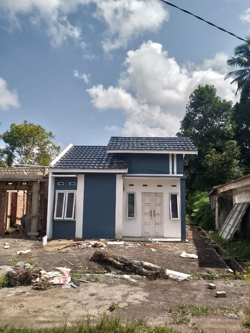 foto tampak rumah tipe BEJO perumahan MARMOUNT LAND