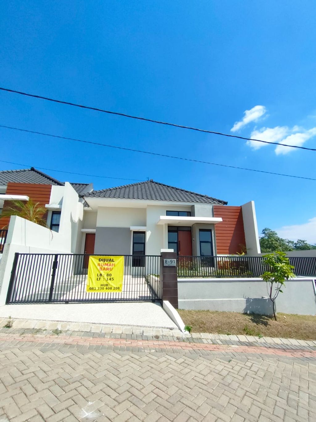 foto tampak rumah tipe CLOVE perumahan RIVERFRONT URBAN RESORT