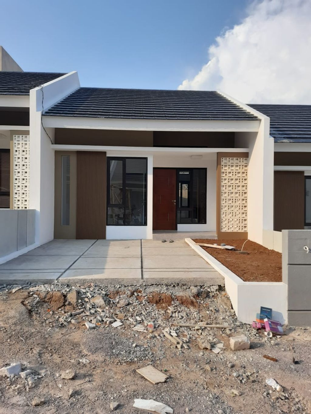 foto tampak rumah tipe 36/135 (B) perumahan GREEN HARMONI RESIDENCE