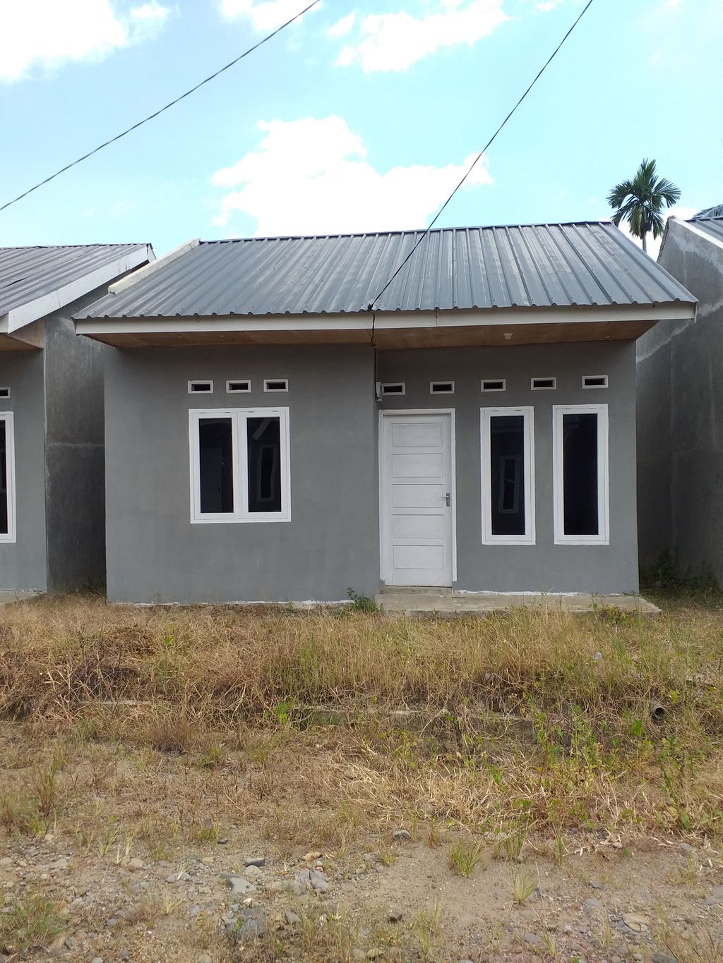 foto contoh rumah perumahan Melaju Residence