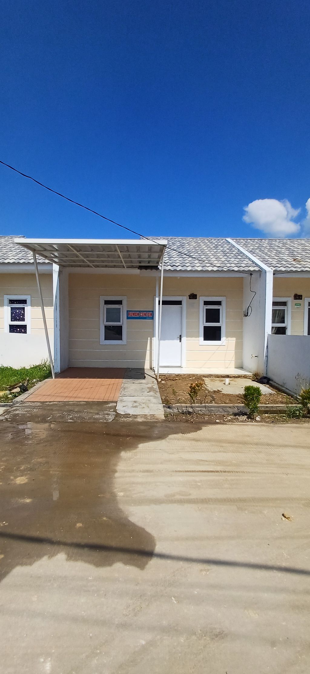 foto tampak rumah tipe 27/60 perumahan GRAHA CIPTA 5 SUMBERJAYA
