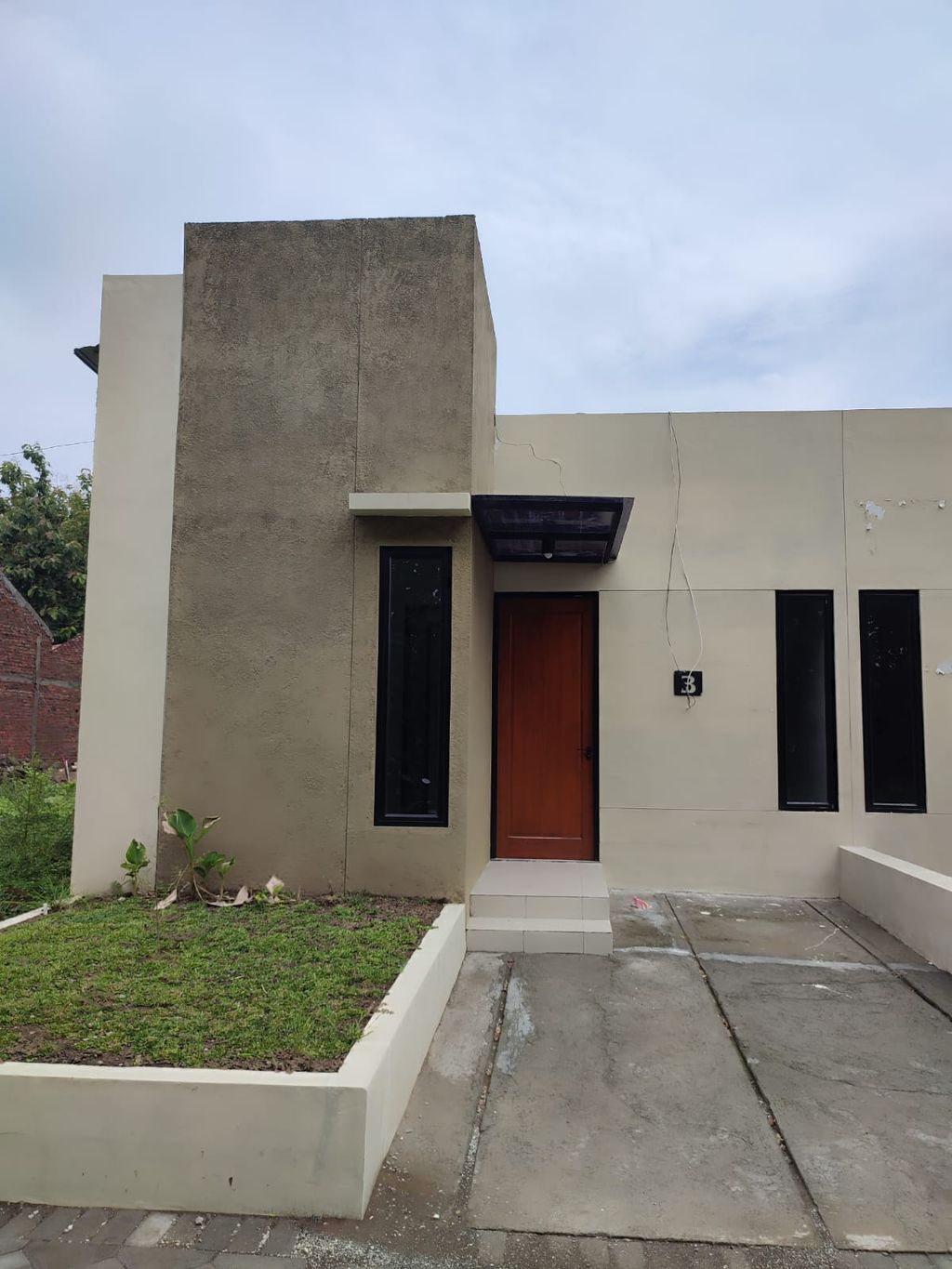 foto tampak rumah tipe LOTUS perumahan Casa Primera Kroyo