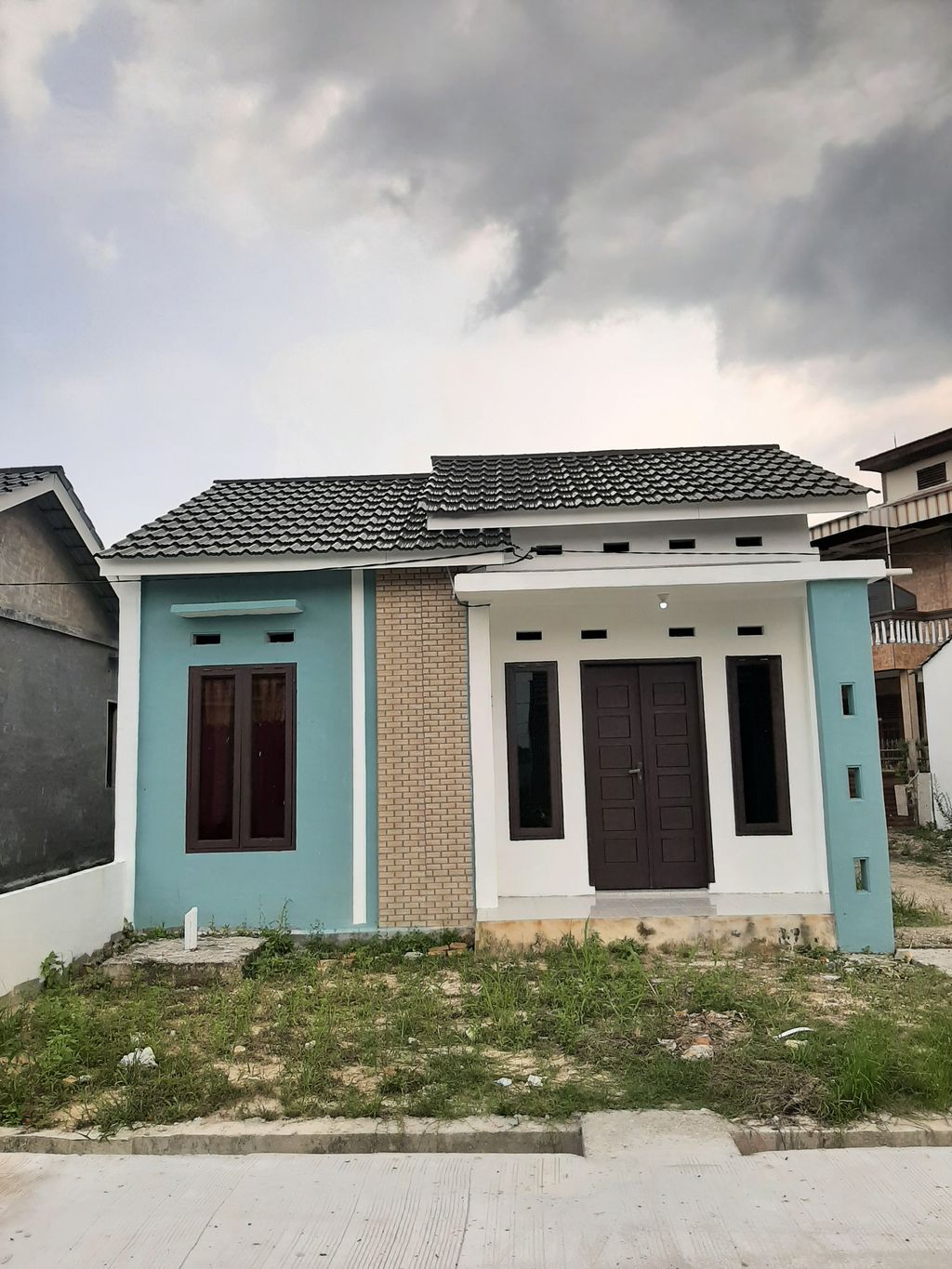 foto contoh rumah perumahan PUTRA KARTAMA