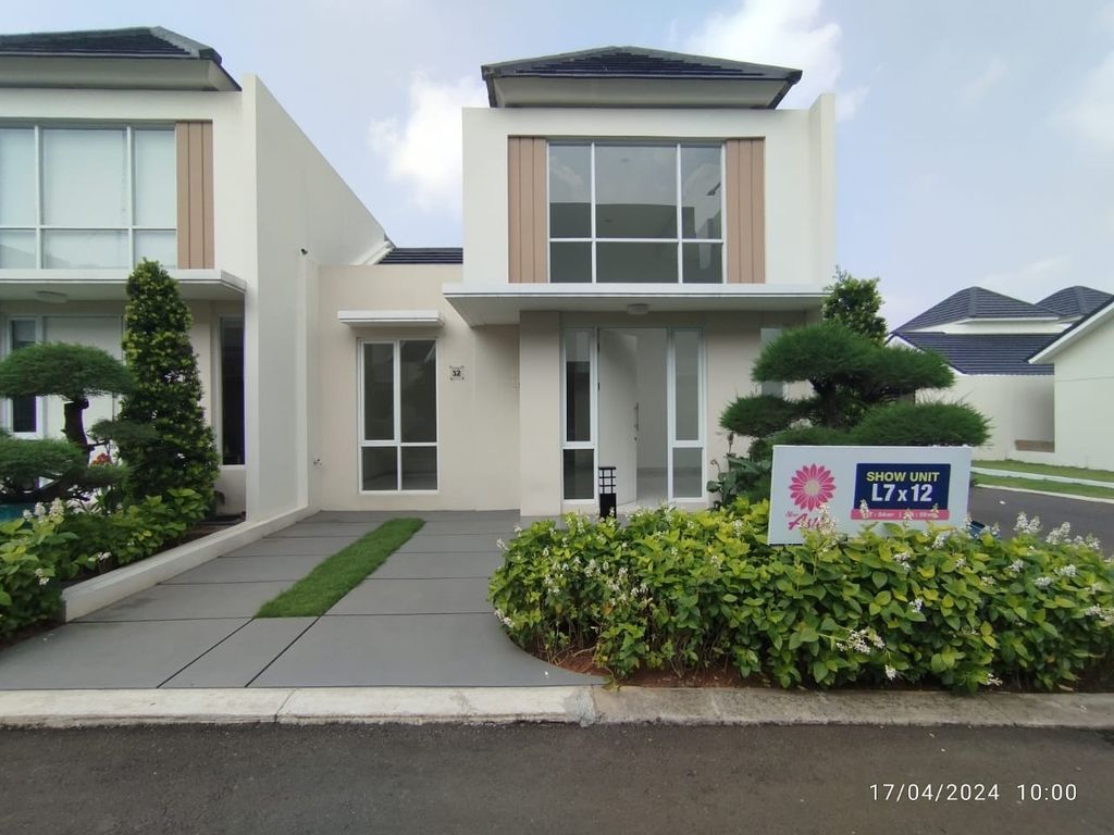 foto tampak rumah tipe ASTER 2/32 perumahan PARAMOUNT PETALS TAHAP 1