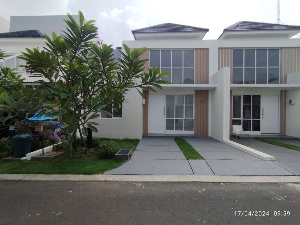 foto tampak rumah tipe ASTER 2/31 perumahan PARAMOUNT PETALS TAHAP 1
