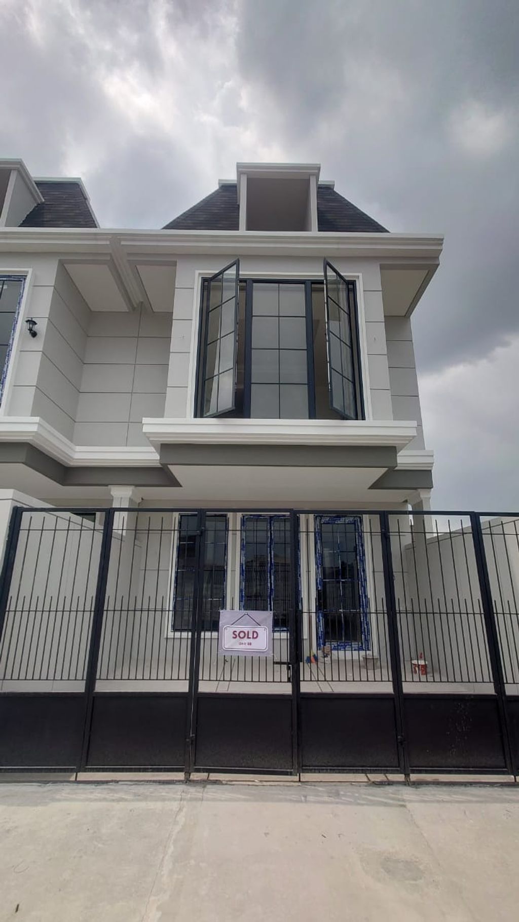 foto tampak rumah tipe Basic perumahan Puri Gardena