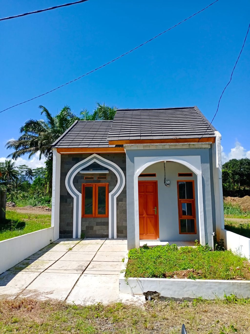 foto tampak rumah tipe 36 perumahan Tasnim Riverside