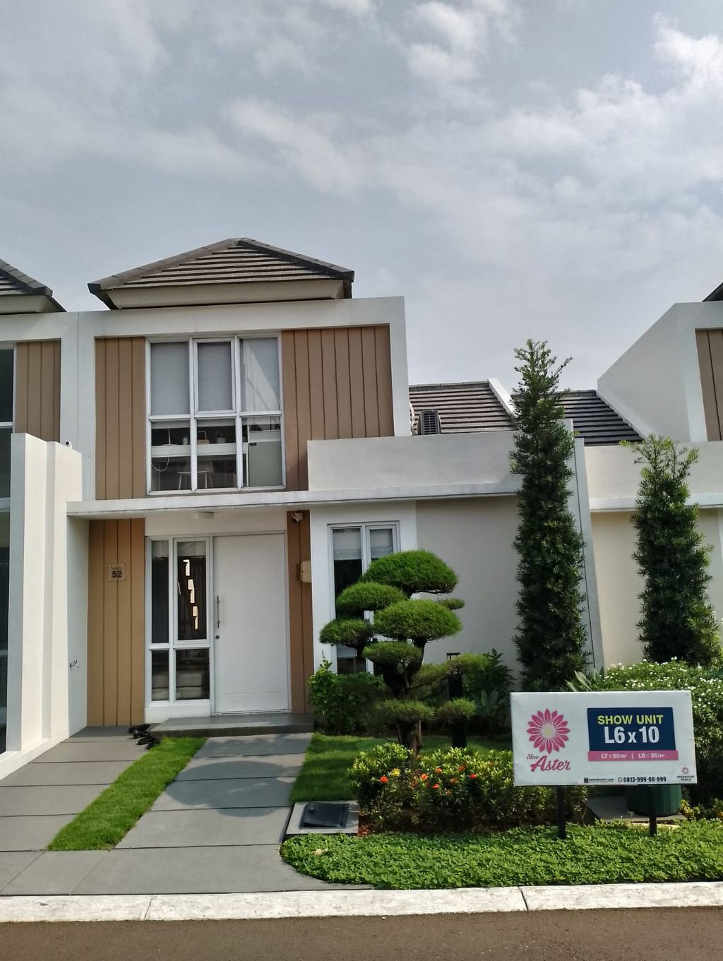foto tampak rumah tipe ASTER 2/52 perumahan PARAMOUNT PETALS TAHAP 1