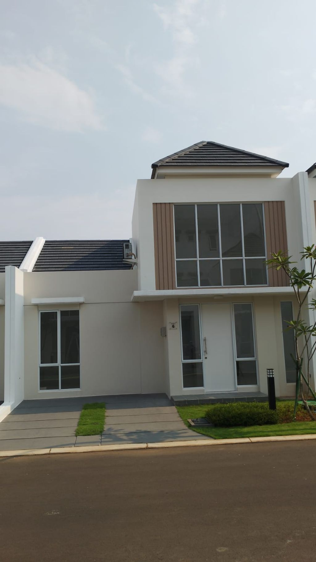 foto tampak rumah tipe ASTER 1/03 perumahan PARAMOUNT PETALS TAHAP 1