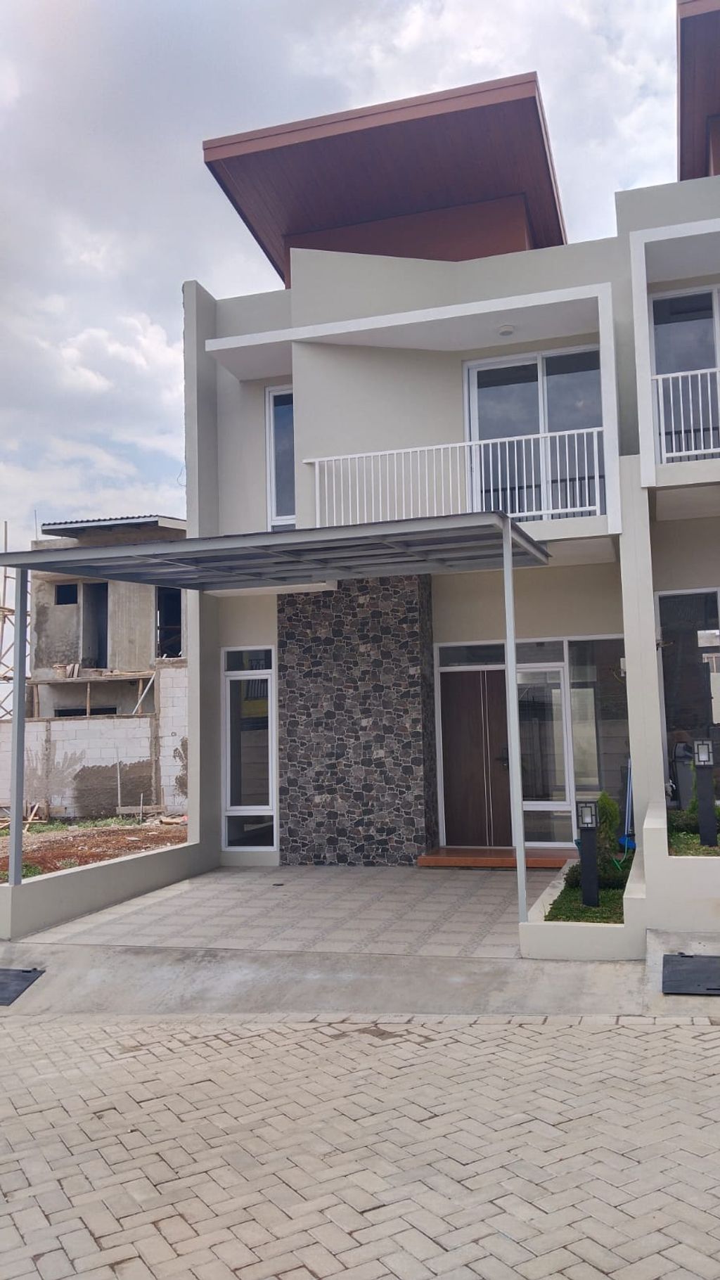 foto tampak rumah tipe 50/64 perumahan Jatinangor City Park