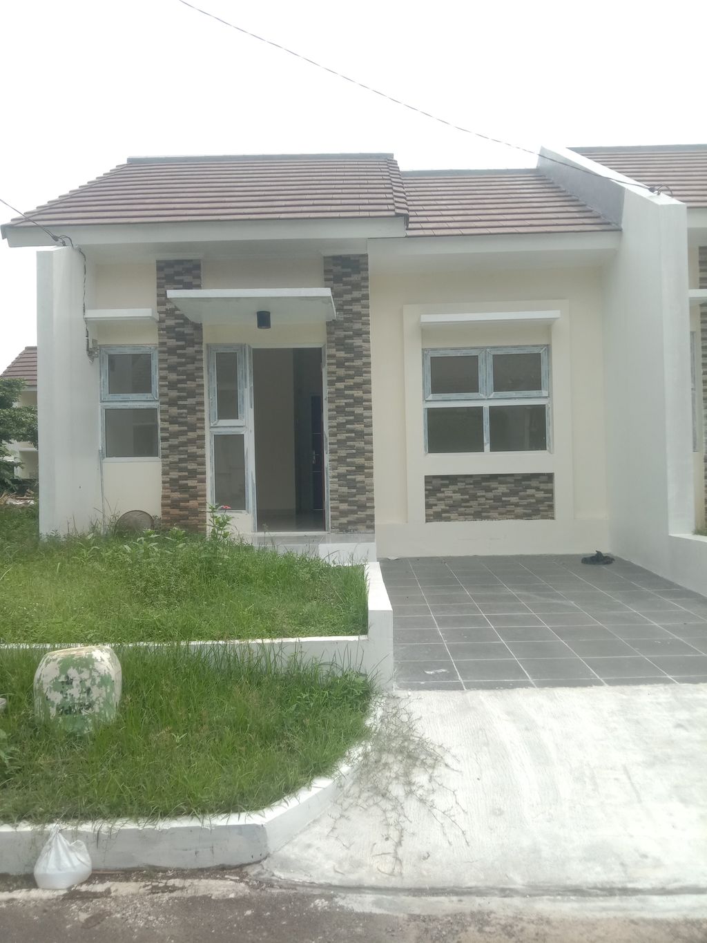 foto tampak rumah tipe 36/165 (Tahun 2024) perumahan Sawangan Residence Ideal