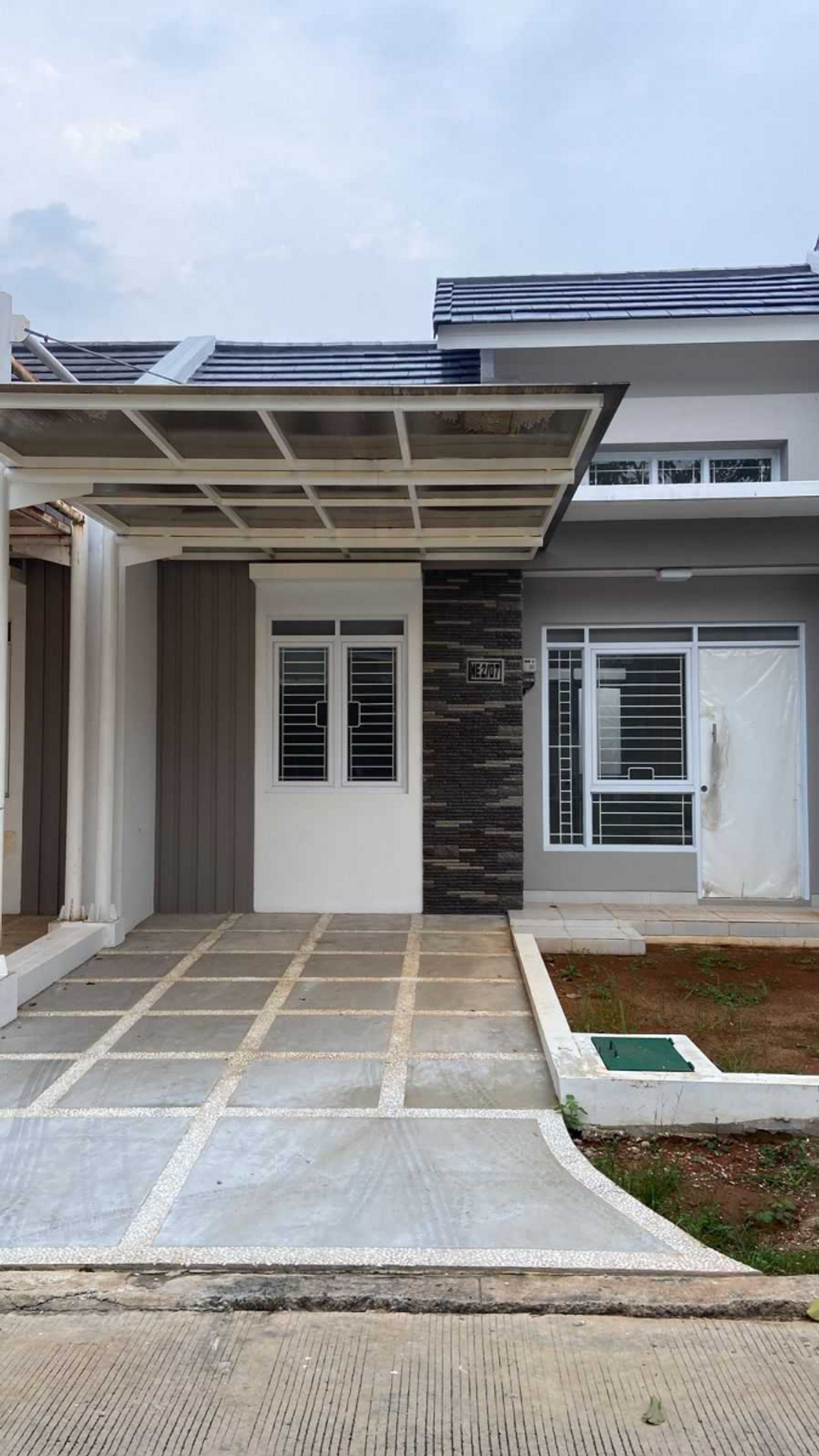 foto tampak rumah tipe NE II - 0007 perumahan SERPONG NATURA CITY
