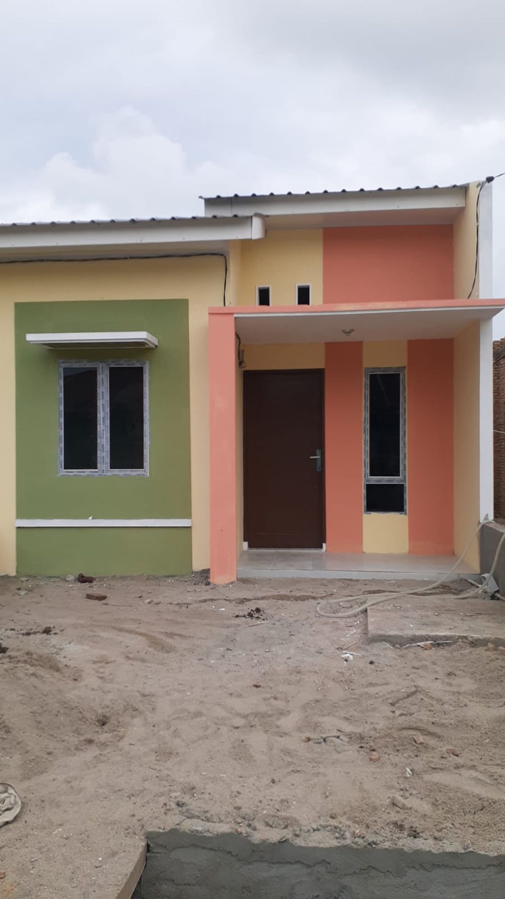 foto tampak rumah tipe 36 perumahan PERUMAHAN PESONA KARYA 2