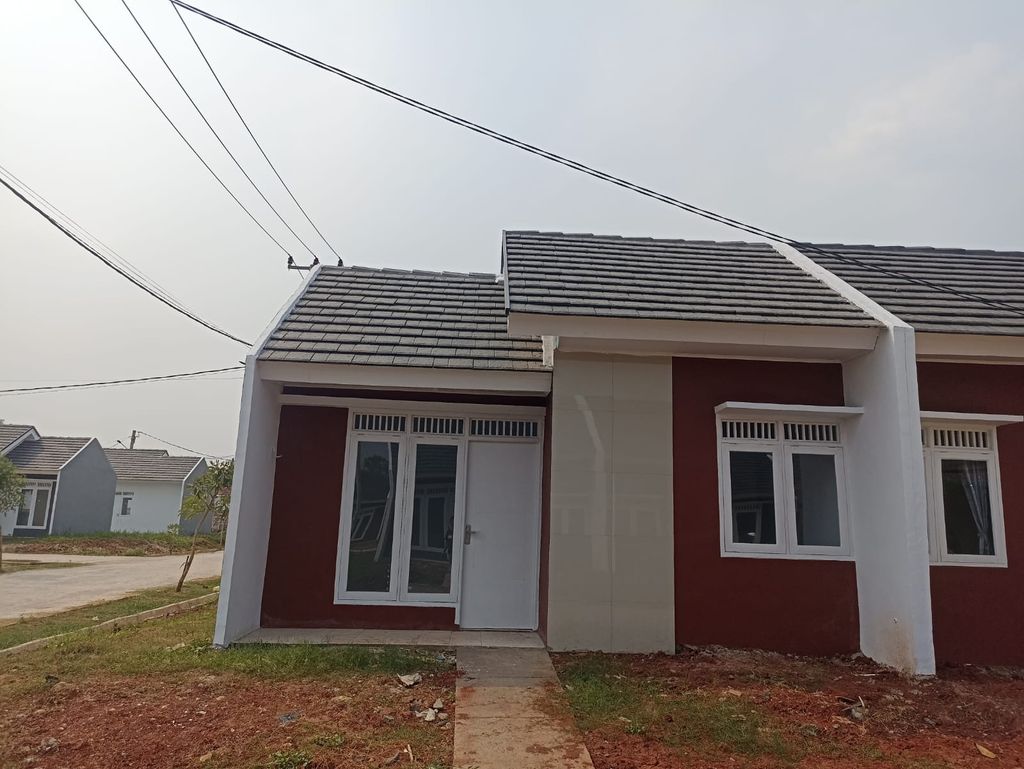 foto tampak rumah tipe 22/110 perumahan Grand Tamansari 3 Residence