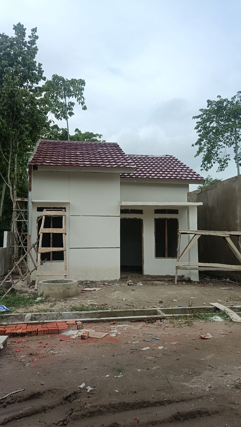 foto tampak rumah tipe 36 perumahan PESONA KAYU KOLIM