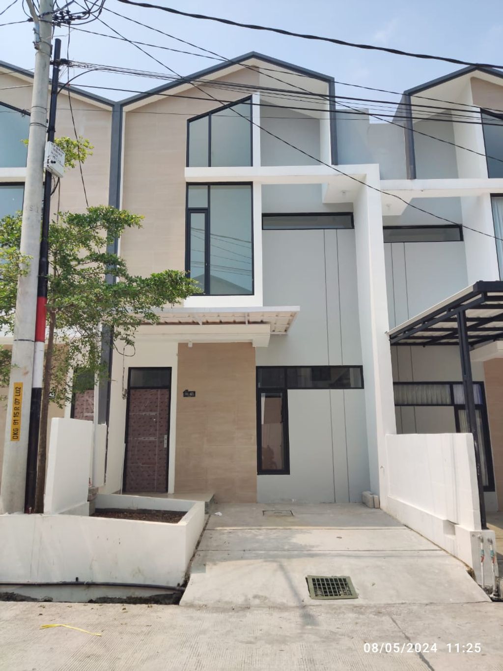 foto tampak rumah tipe 47 Compact High Ceiling (491) perumahan G-Land Katapang Residence 1