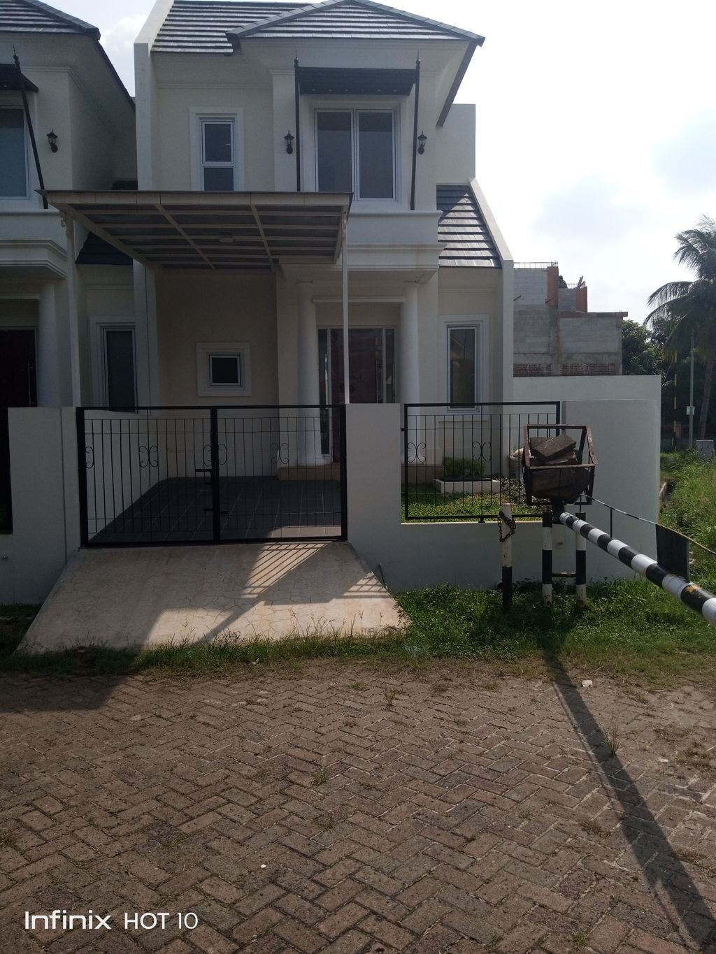 foto tampak rumah tipe ALFIORE A12/30 perumahan CLUSTER ALFIORE