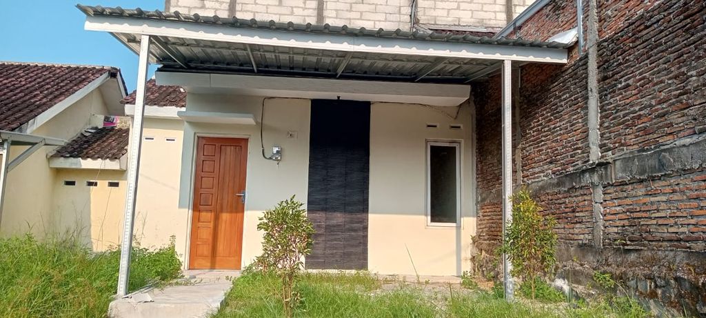 foto tampak rumah tipe RST. 21/60 perumahan Jeruksawit Permai 159 Unit