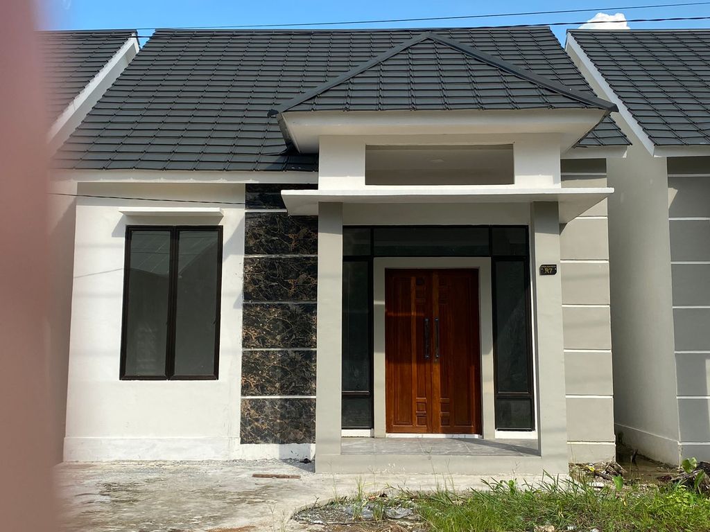 foto tampak rumah tipe 65 perumahan MEGA MANSION
