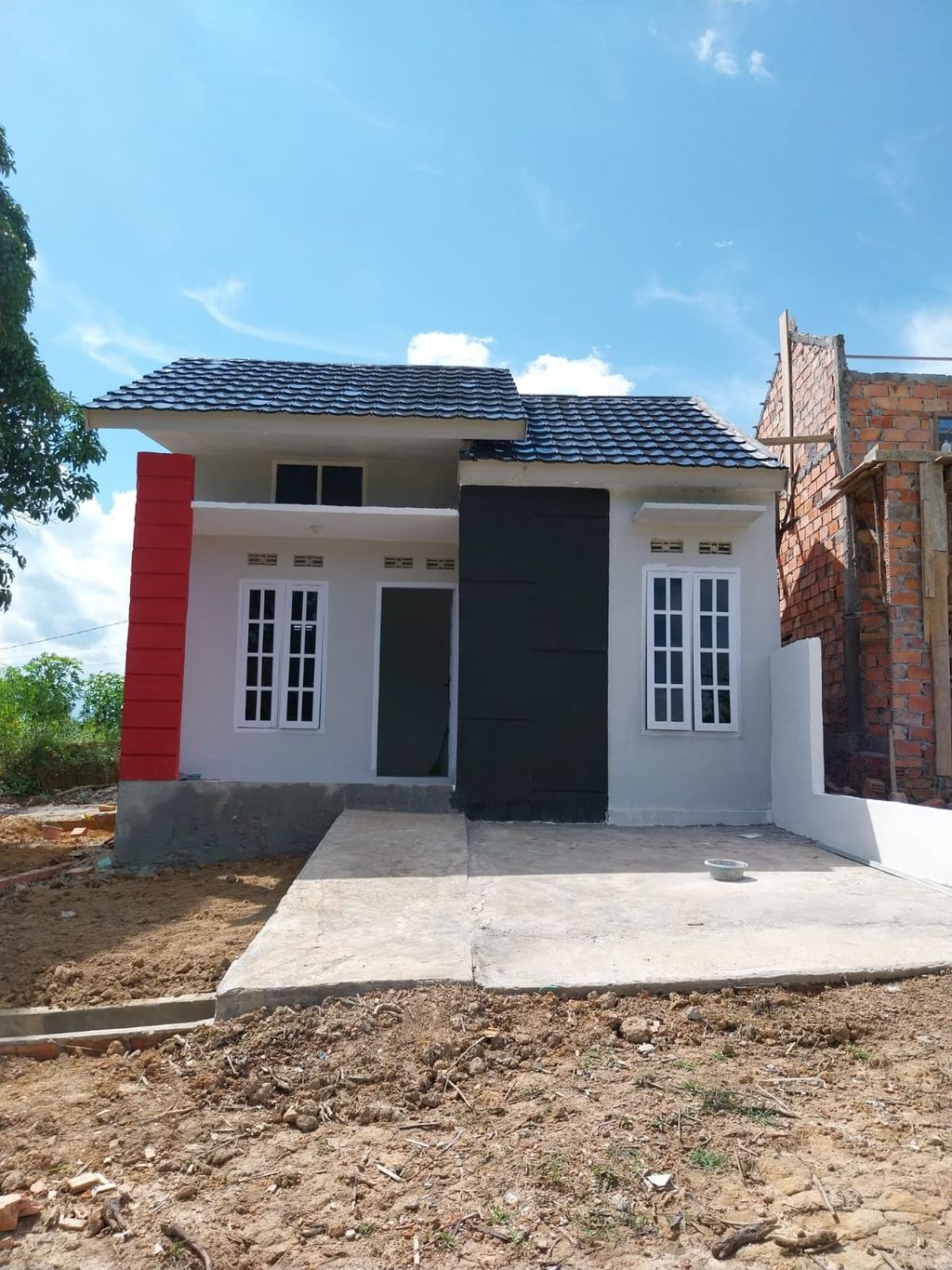 foto tampak rumah tipe 36/91 perumahan GRIYA DELIMA ASRI 2