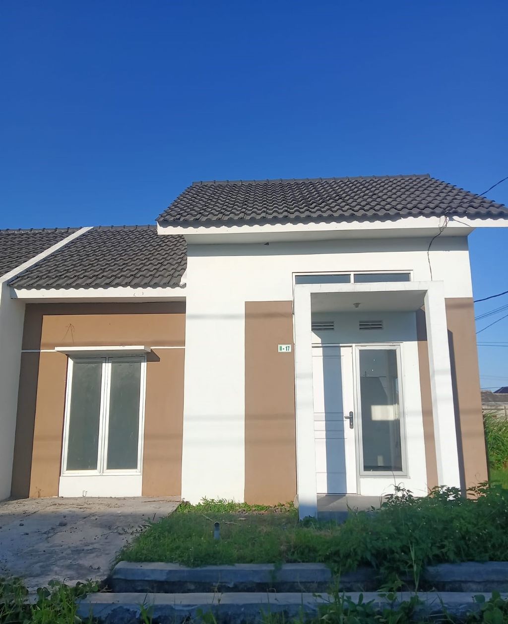 foto tampak rumah tipe Neo Daisy perumahan The Quality Riverside