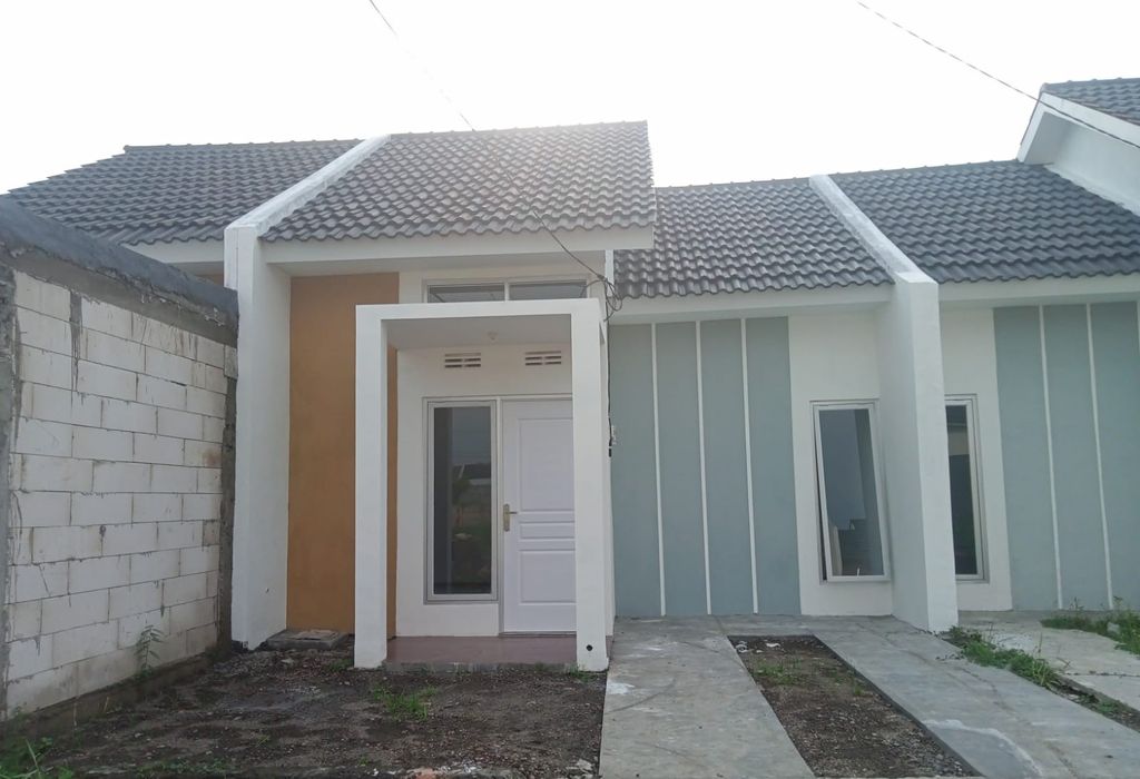 foto tampak rumah tipe Lotus perumahan The Quality Riverside