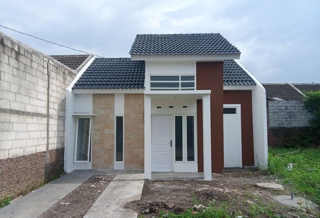 foto tampak rumah tipe Fusia perumahan The Quality Riverside