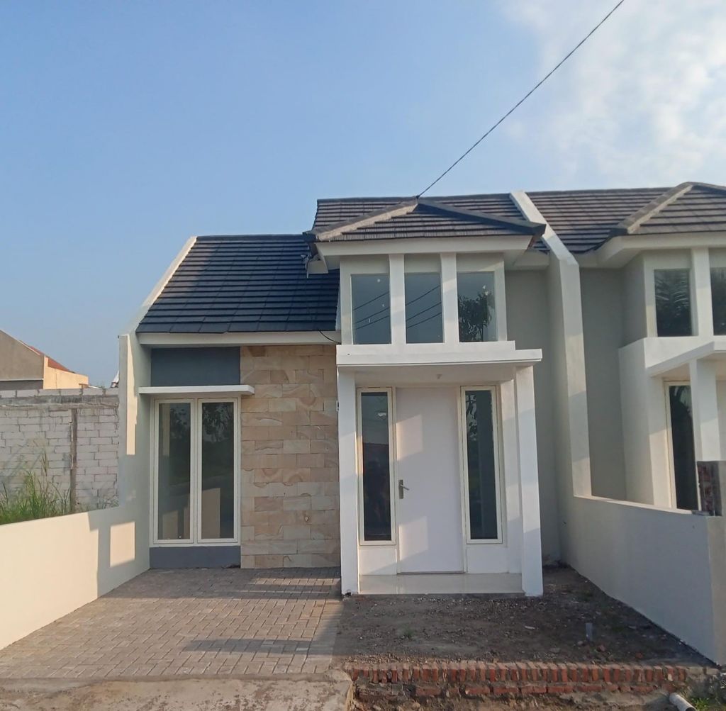 foto tampak rumah tipe Gardenia perumahan The Quality Riverside