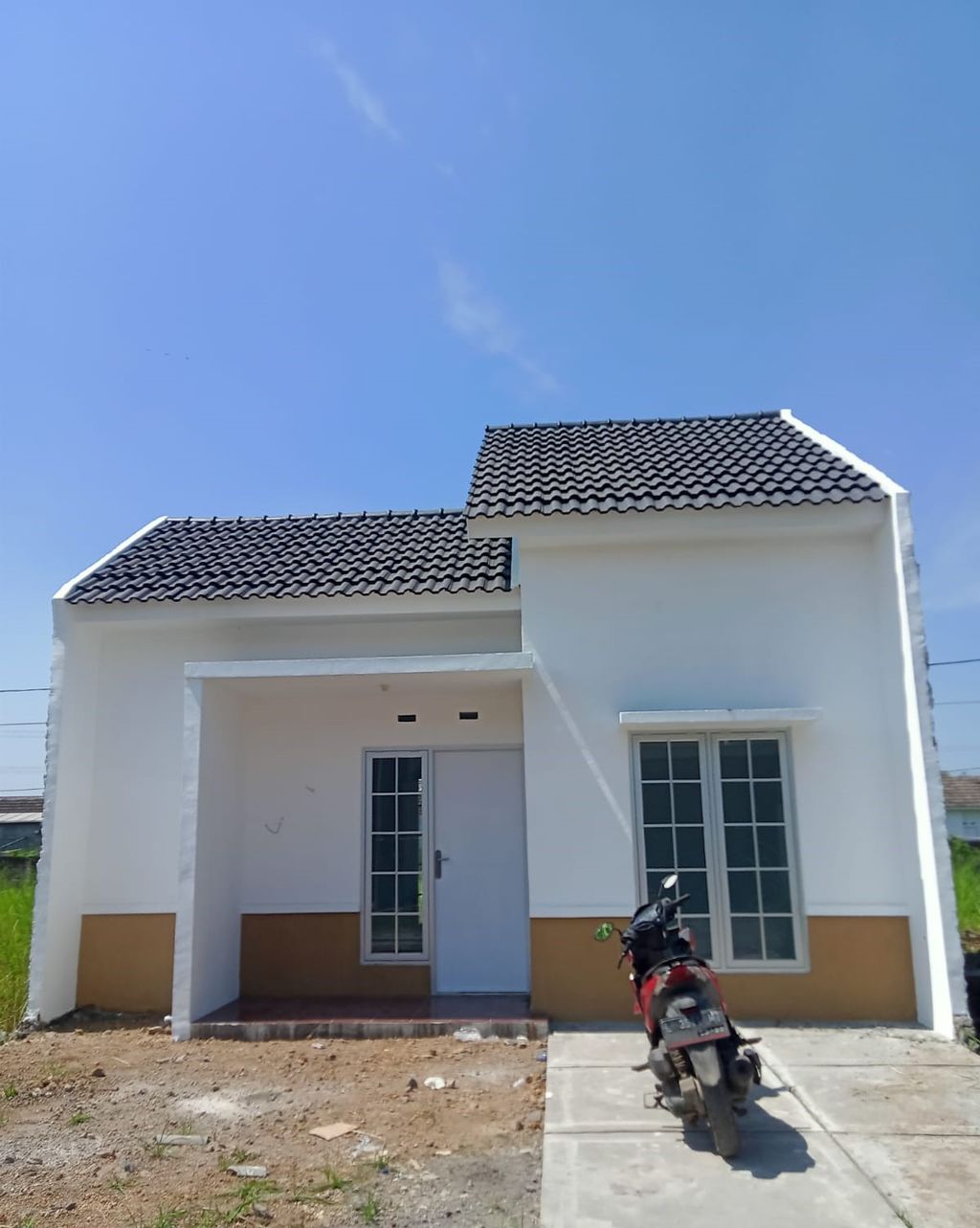 foto tampak rumah tipe Neo Sakura perumahan The Quality Riverside