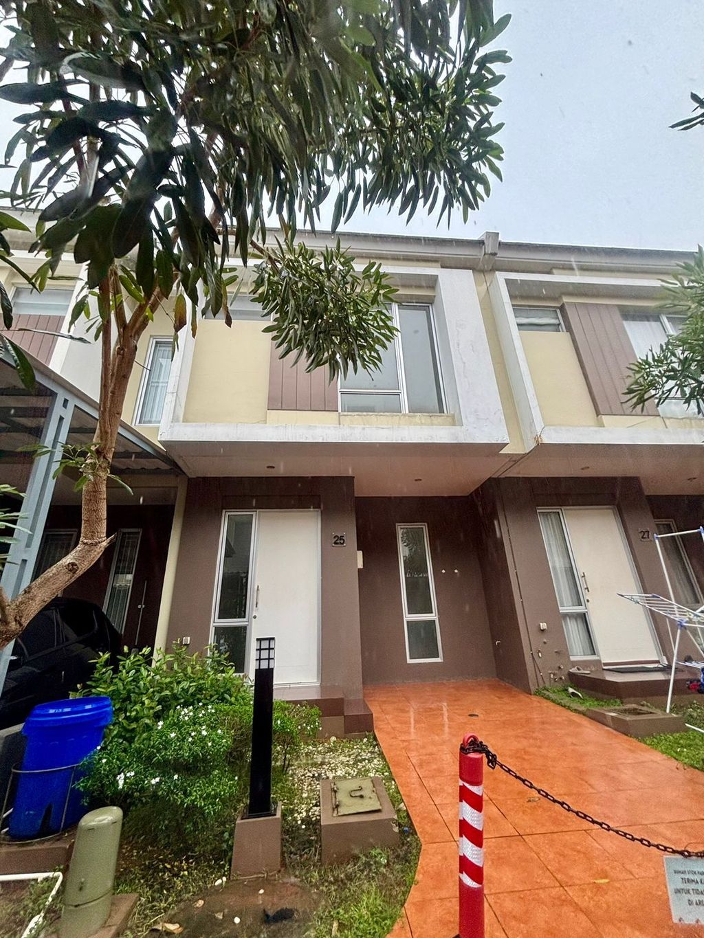 foto tampak rumah tipe PENA/25 perumahan CLUSTER MALIBU VILLAGE