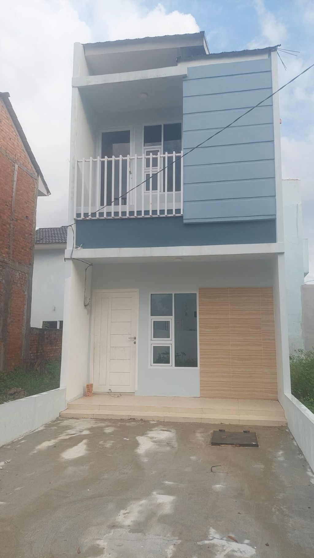 foto tampak rumah tipe 64/45 perumahan TOWNHOUSE PASUNDAN LAND
